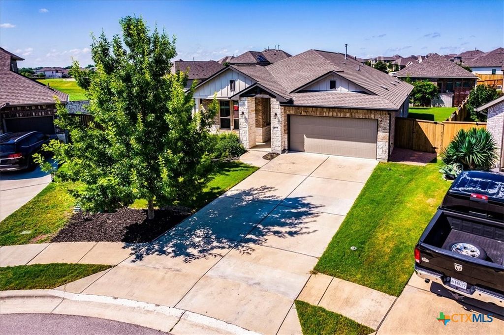 Photo of 712 Coyote Creek Way, Kyle, TX 78640 (MLS # 608857)