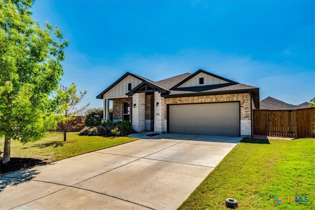 Photo of 712 Coyote Creek Way, Kyle, TX 78640 (MLS # 608857)