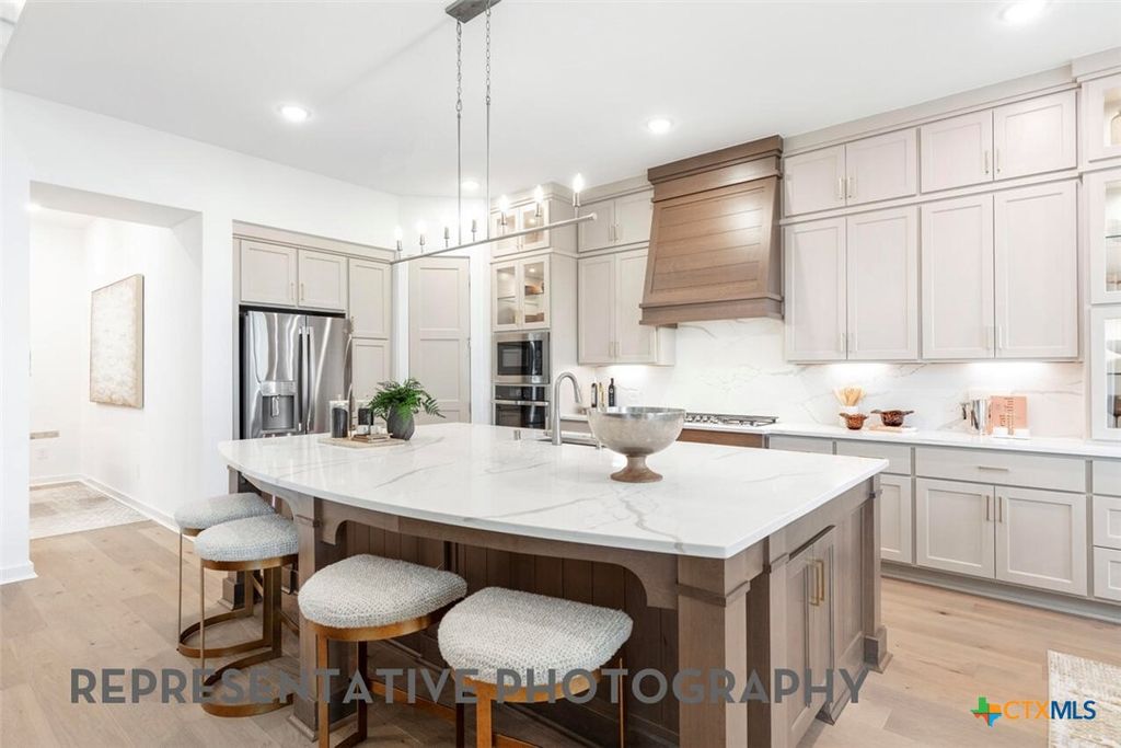Photo of 128 Bigtooth Maple Lane, San Marcos, TX 78666 (MLS # 610482)