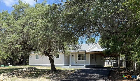 Photo of 560 Wickford Way, Canyon Lake, TX 78133 (MLS # 619009)