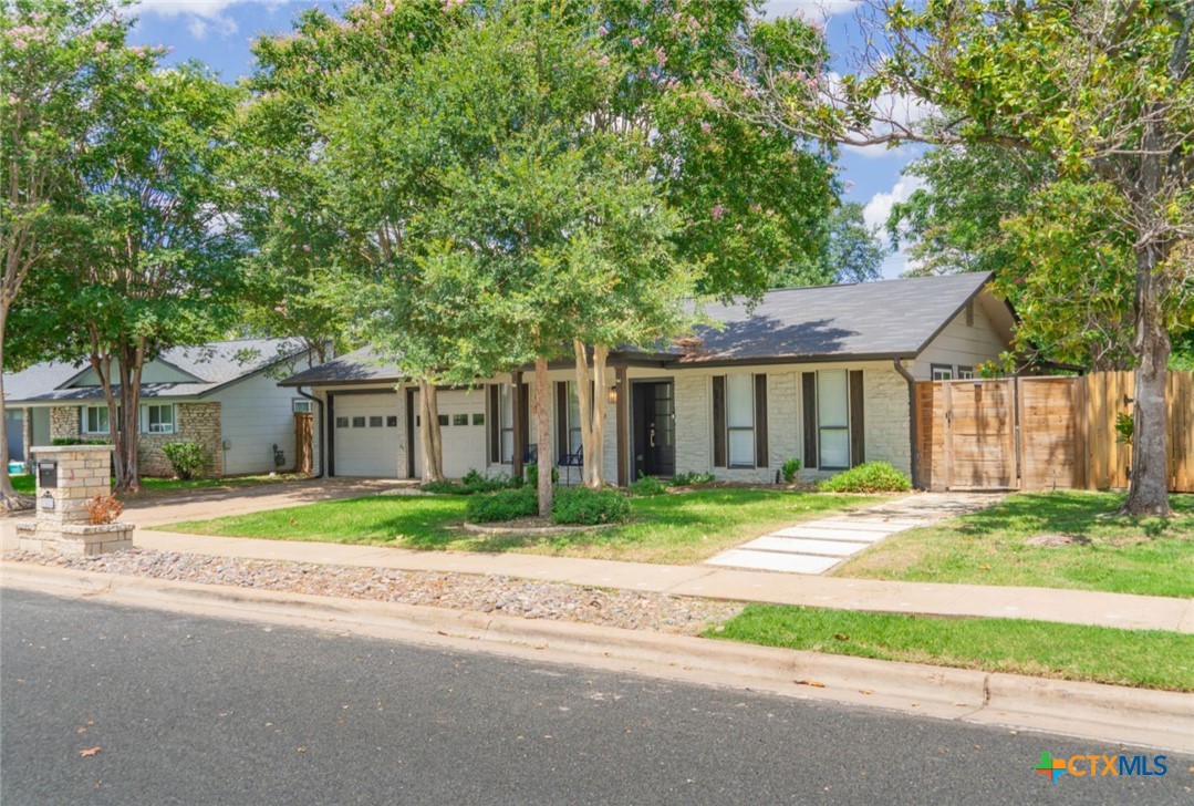 7002 Whispering Oaks Drive