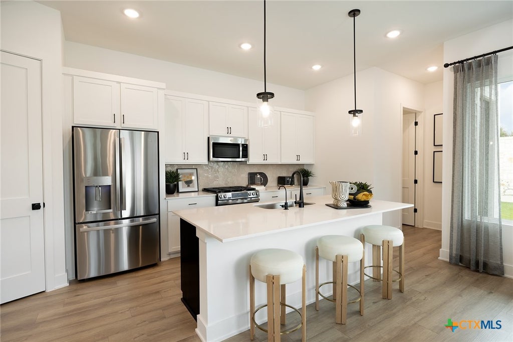 Photo of 8022 Bird Song Circle, Austin, TX 78745 (MLS # 625914)