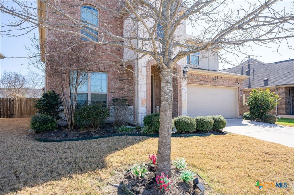 Photo of 634 Blossom Valley Stream, Buda, TX 78610 (MLS # 605357)