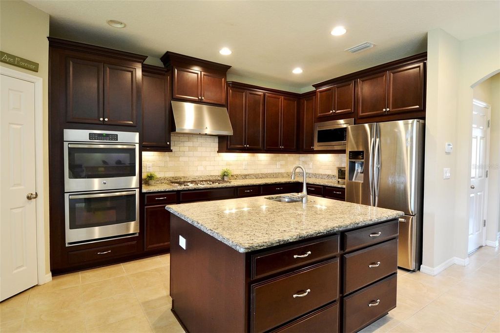 Photo of 11408 Scribner Station Lane, Lithia, FL 33547 (MLS # TB8400227)
