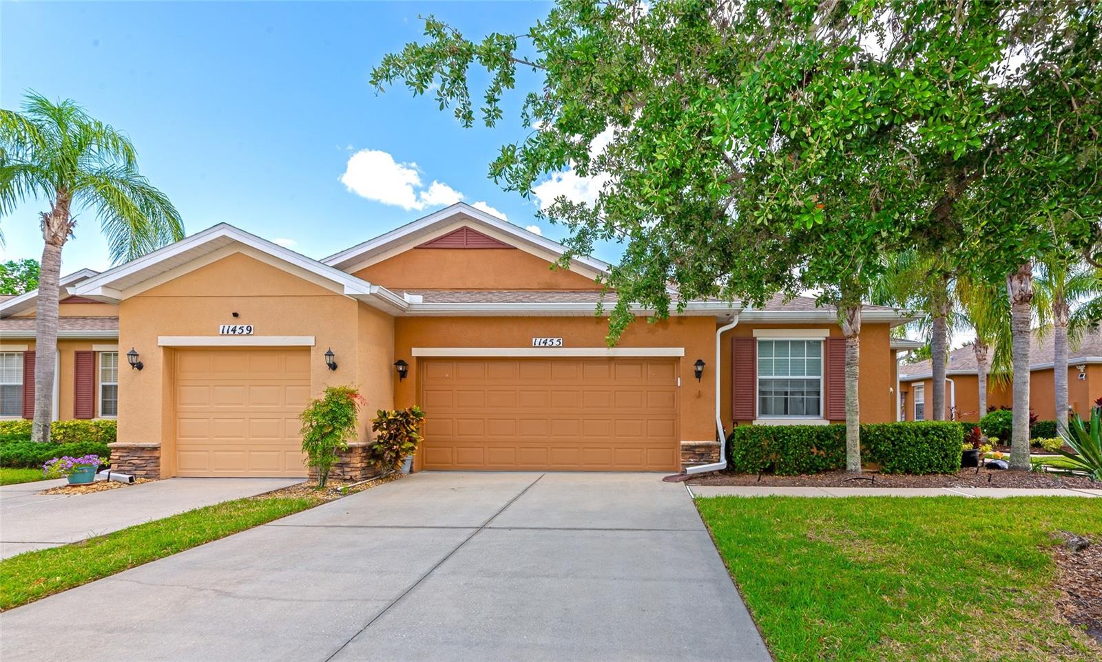 Rarely available end unit featuring 2 bedrooms + den/office, and 2-car garage! The split floorplan offers privacy for both primary residents and their guests while the den/office is perfectly located in the middle near the main living areas. This updated home is sparkling CLEAN and READY for YOU. Inside laundry with washer & dryer, updated guest bathroom, and generous rear screened lanai with access from the living room or primary suite. Spacious, comfortable living. Large primary en-suite with two walk-in closets, dual vanities, and walk-in shower. The villas in Lexington are well maintained and centrally located in Parrish with easy access to new shopping & dining. The community has multiple walking trails, a resort-style community pool & splash pad, playground, tennis, pickleball, and basketball courts. UNFURNISHED annual rental available on or before August 1, 2025. Also for sale or lease option! $50 per adult applicant, security deposit required. No smoking, no pets, no prior evictions.