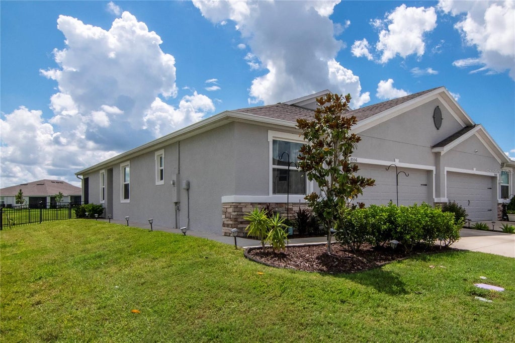 Photo of 8556 Bold Cypress Lane, Wesley Chapel, FL 33545 (MLS # TB8544745)