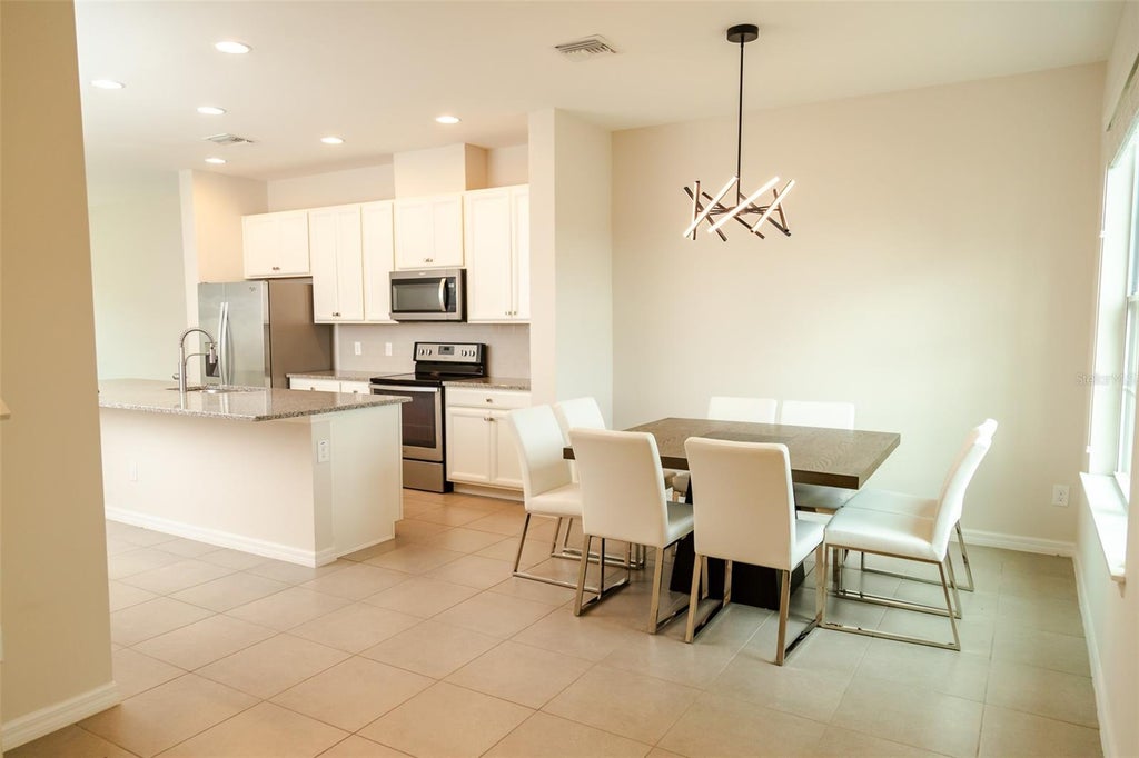 Photo of 11812 Water Run Alley, Windermere, FL 34786 (MLS # O6444415)