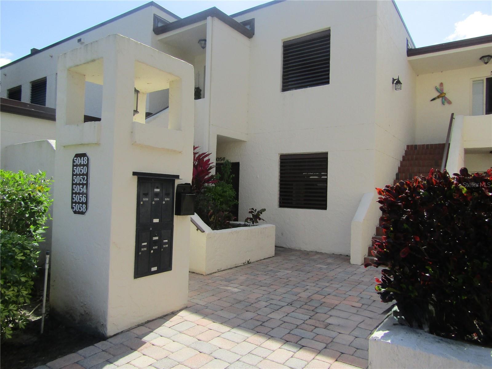 This graciously appointed 3 bedroom 2 bath ground floor condo is the perfect place to your winter vacation. This property has many updates throughout which include an updated kitchen with stainless steel appliances and granite countertops. Travertine flooring, updated baths and new furnishings. Located in the "Heart of The Meadows" with stunning view of the 16th hole of the golf course from the outdoor rear patio. There is a covered carport for parking which keeps your vehicle out of the sun. This condo is located steps away from the community heated pool and walking distance to The Meadows Community Center. Located minutes away from the University Town Center Mall, Benderson Rowing Park, downtown Sarasota and the sun coasts amazing beaches. Owner prefers no pets, this is a NO smoking unit.