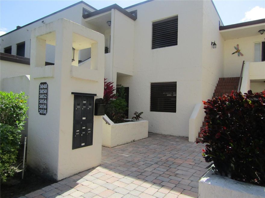 This graciously appointed 3 bedroom 2 bath ground floor condo is the perfect place to your winter vacation. This property has many updates throughout which include an updated kitchen with stainless steel appliances and granite countertops.  Travertine flooring, updated baths and new furnishings.  Located in the "Heart of The Meadows" with stunning view of the 16th hole of the golf course from the outdoor rear patio.  There is a covered carport for parking which keeps your vehicle out of the sun.  This condo is located steps away from the community heated pool and walking distance to The Meadows Community Center.  Located minutes away from the University Town Center Mall, Benderson Rowing Park, downtown Sarasota and the sun coasts amazing beaches.  Owner prefers no pets, this is a NO smoking unit.