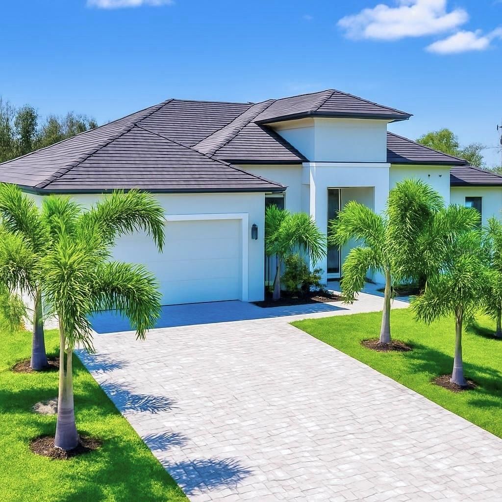 Photo of 1 White Marsh Road, Rotonda West, FL 33947 (MLS # A4685299)