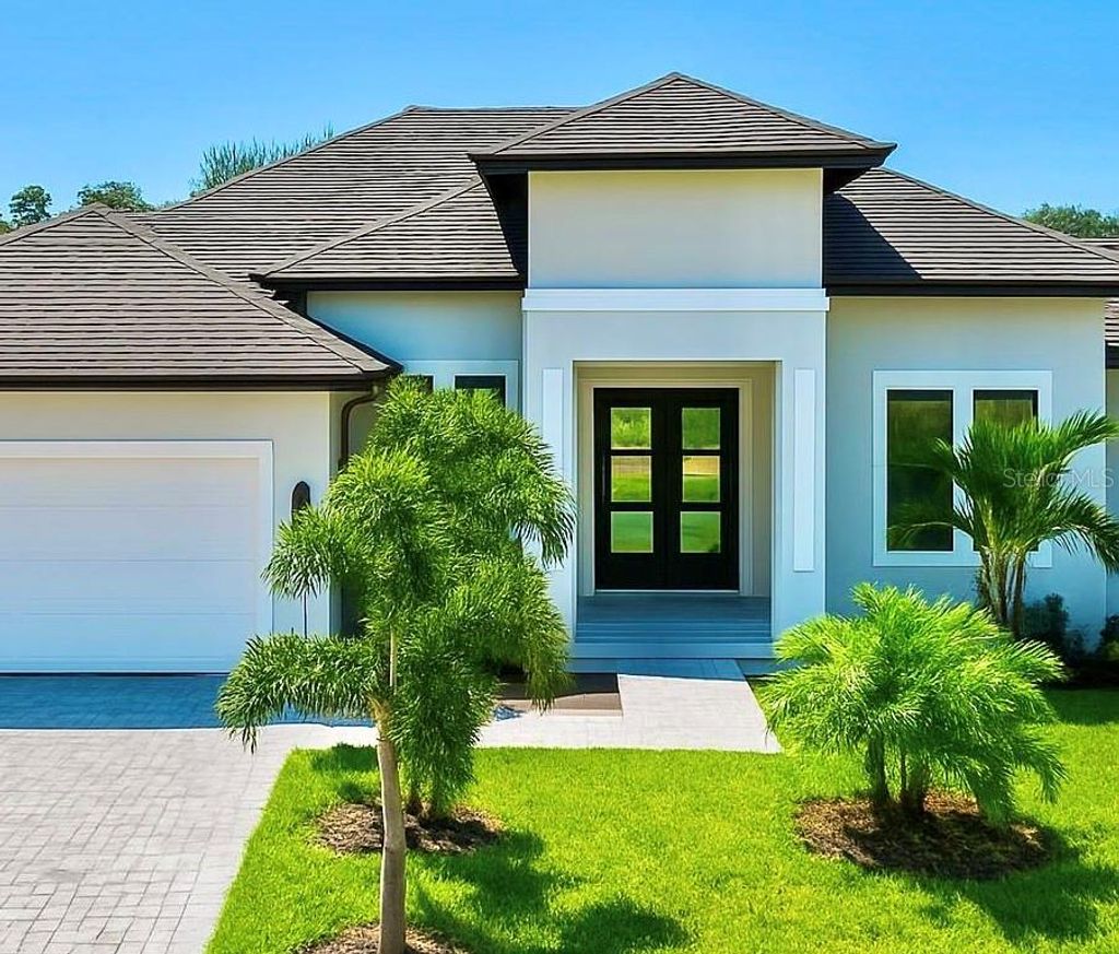 Photo of 1 White Marsh Road, Rotonda West, FL 33947 (MLS # A4685299)