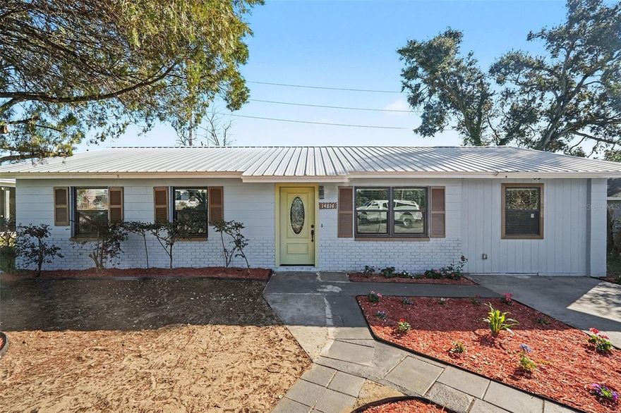 MOVE-IN READY | FULLY REMODELED | USDA 100% FINANCING AVAILABLE . Welcome to this beautifully renovated 4-bedroom, 1-bath home located in charming Dade City—where modern updates meet small-town Florida living. Completely remodeled from top to bottom, this home is absolutely perfect for first-time homebuyers or anyone looking for peace of mind and turnkey living. Every major system has been upgraded, including: New metal roof; Brand-new HVAC system with new ductwork; All-new electrical; Fully updated plumbing throughout;  New windows; New flooring throughout the home. The heart of the home is the spectacular, fully renovated kitchen, featuring gorgeous granite countertops, a stunning modern backsplash, sleek stainless-steel appliances, and abundant shaker-style cabinetry—both stylish and functional for everyday living and entertaining. While the home offers one bathroom, it has been fully remodeled with elegant porcelain tile, modern finishes, and a clean, timeless design. Enjoy an expansive front yard, ideal for gatherings and curb appeal, but the true showstopper is the large enclosed lanai and spacious, fenced backyard—perfect for entertaining, relaxing, gardening, or enjoying Florida’s outdoor lifestyle year-round. Additional highlights include: Long driveway with ample parking for vehicles, boats, or recreational toys. NO HOA, NO CDD, and NO flood insurance required. Freedom from deed restrictions. Ideally located just minutes from Historic Downtown Dade City, you’ll love being close to charming shops, local restaurants, coffee houses, festivals, and community events. Enjoy the peaceful small-town feel while maintaining quick access to major highways for easy commutes to Tampa, Lakeland, Ocala, and Orlando. This home truly checks every box—style, updates, location, and affordability. USDA eligible with 100% financing available!  Schedule your private tour today—homes like this don’t last long!