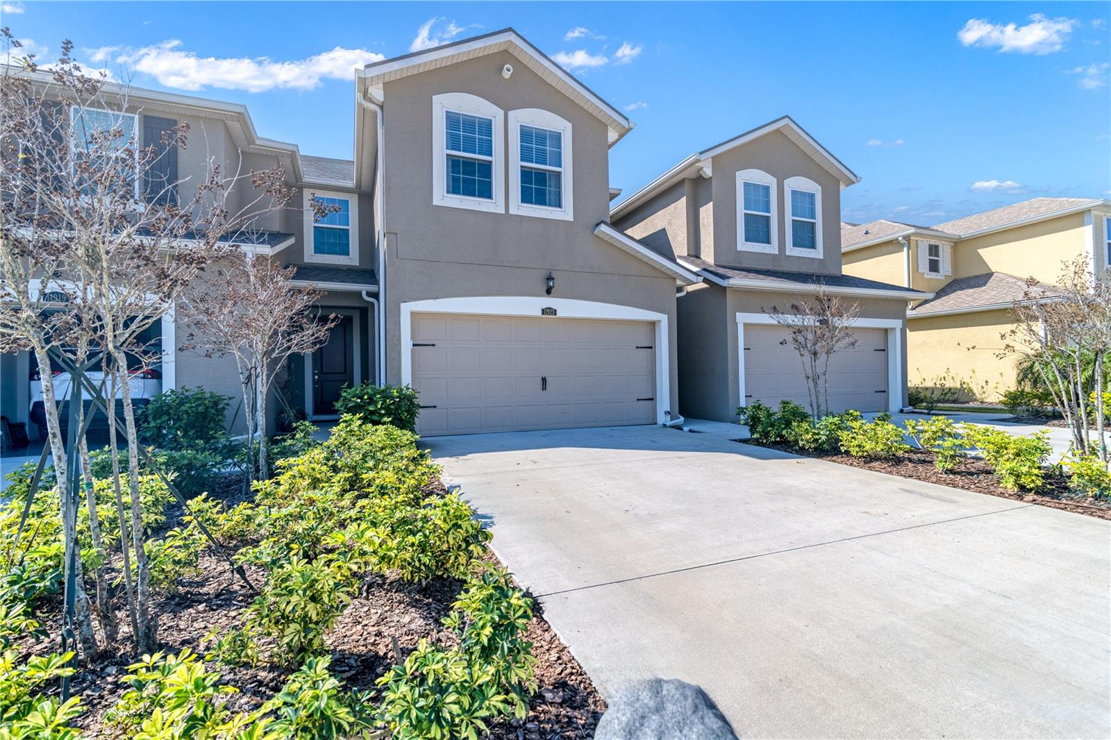 Charming 3-Bedroom Townhome for Rent in the community of Harmony in Lakewood Ranch. Welcome to your new home! This stunning 3-bedroom, 2.5-bathroom townhome, built in 2020, offers modern living with a touch of elegance. Located in a vibrant community, this pet-friendly residence combines comfort with convenience. Step inside to discover a spacious Great Room plan featuring an open-concept layout perfect for entertaining. The gourmet kitchen boasts sleek Quartz countertops, stainless steel appliances, and a cozy eating space. Enjoy the ease of tile floors throughout the downstairs, complemented by a conveniently located half-bath for guests. Upstairs, you'll find a thoughtfully designed laundry room, a luxurious primary bedroom with an en suite bathroom complete with dual sinks and a spacious shower stall. Two additional guest bedrooms and a well-appointed bathroom with a shower/tub combo complete the upper level. Additional features of this home include a salt system water softener, washer & dryer and a 2-car attached garage. Relax and unwind on the screened-in lanai just off the kitchen overlooking a pond, offering a perfect retreat for enjoying your morning coffee or evening breeze. The community enhances your lifestyle with resort-style amenities including a swimming pool, fitness center, and playground. With nearby access to a variety of restaurants, a hospital, schools, and golf courses, you'll have everything you need within reach. Don’t miss out on the opportunity to make this beautiful townhome your next rental. Schedule a viewing today!