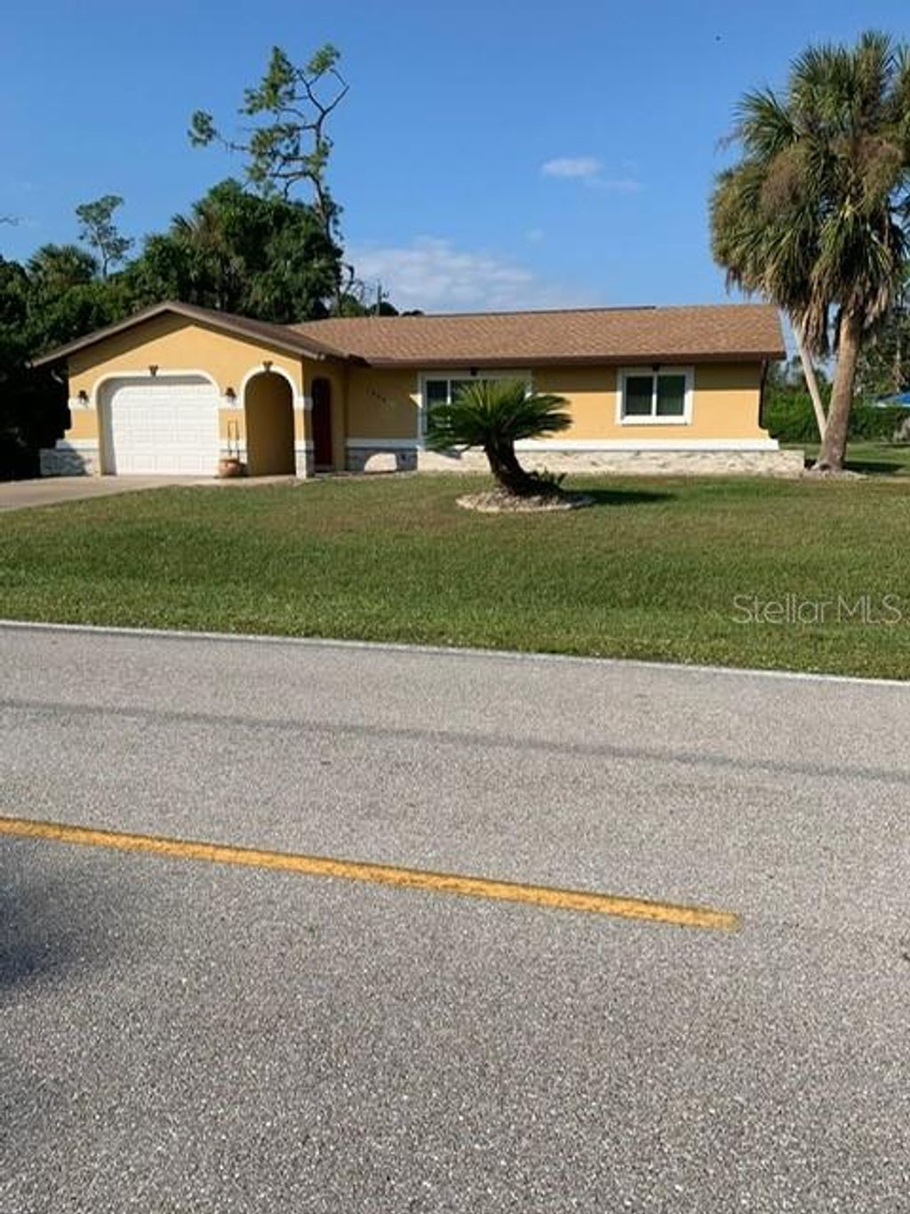 Photo of 1409 Yorkshire Street, Port Charlotte, FL 33952 (MLS # O6322746)