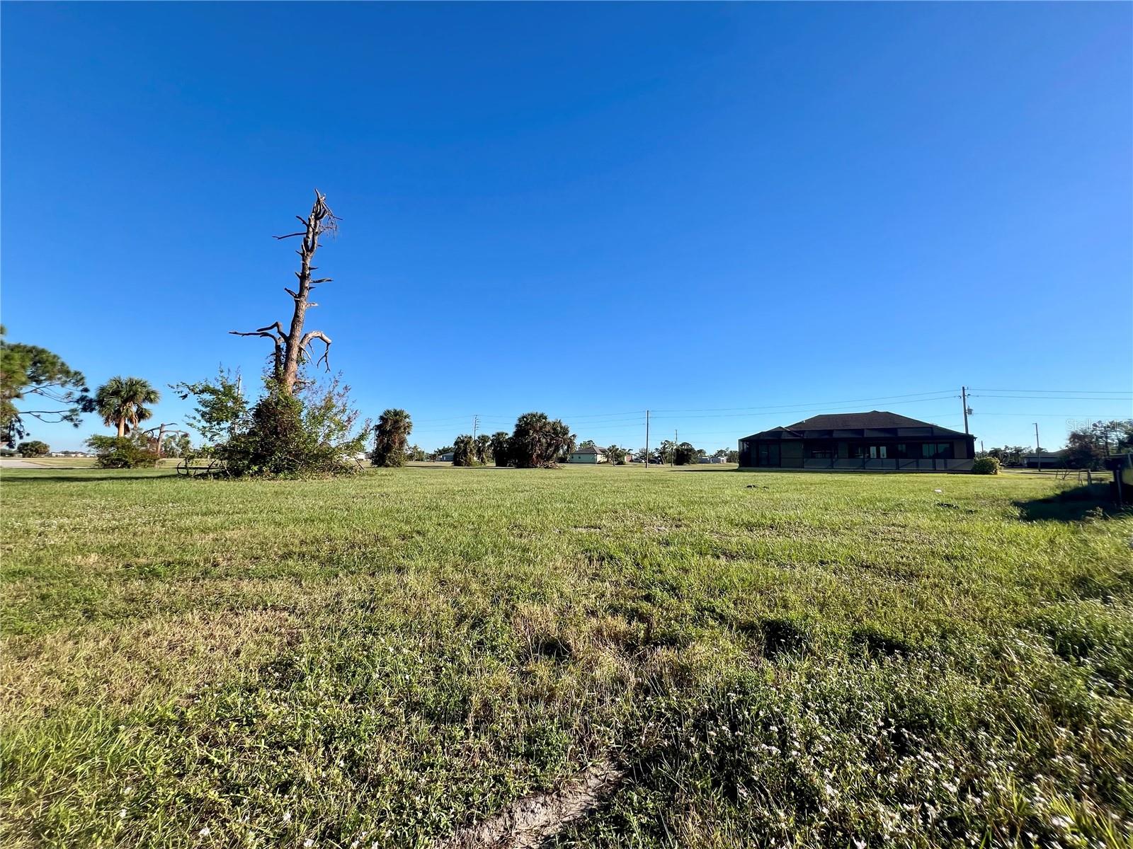 Beautiful lot available in the community of Rotonda Sands. New construction nearby.