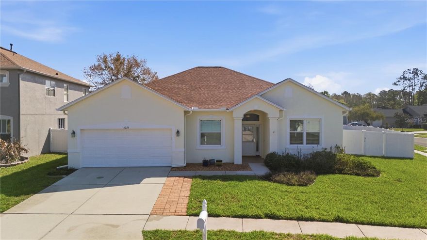 Welcome to this beautifully maintained 4-bedroom, 2-bath pool home located in the highly sought-after Grand Oaks community of Land O’ Lakes. Situated on a spacious corner lot measuring .23 acres (10,220 sq. ft.), this 2,079 sq. ft. home offers the perfect balance of comfort, style, and Florida outdoor living. Step inside to find tile flooring throughout, creating a clean, cohesive look and easy maintenance. The updated kitchen features stone countertops, new stainless steel appliances, and plenty of space for cooking and entertaining. The home also includes a formal dining room and a bonus room accented with crown molding, adding character and flexibility for gatherings, a home office, or additional living space. Enjoy the Florida lifestyle year-round in your fully screened-in in-ground pool, overlooking a fully vinyl-fenced backyard that offers privacy and room to relax, entertain, or let pets play freely. Major updates provide peace of mind, including a new roof (2021), HVAC system, and water heater replaced in 2020. Grand Oaks is known for its beautiful tree-lined streets, parks, playgrounds, community pool, clubhouse, and tennis courts, creating a welcoming neighborhood atmosphere. Residents enjoy convenient access to top-rated schools, shopping, dining, and major roadways, including SR-54 and the Suncoast Parkway, making commuting to Tampa, Wesley Chapel, and Tampa International Airport simple. Nearby attractions include The Shops at Wiregrass, Tampa Premium Outlets, golf courses, nature trails, and numerous parks, offering endless options for recreation and entertainment. If you’re looking for a well-maintained pool home in one of Land O’ Lakes’ most desirable communities, this property offers comfort, convenience, and value all in one. Schedule your private showing today.