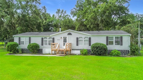 Photo of 10838 NW 8th Street, Ocala, FL 34482 (MLS # D6148604)
