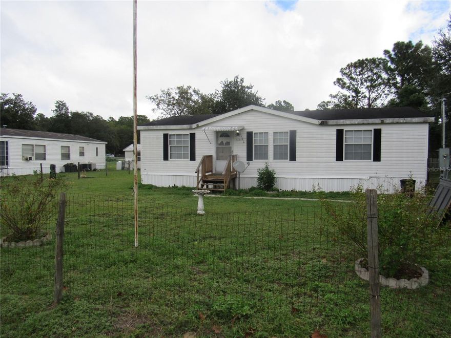 Here is your opportunity to make this home your very own or remodel as an investment.  This three bedroom, two bath home is ready for your personal touches.  The roof is original and needs to be replaced but it is not leaking.  The carpet needs replacing, but you can decide if you want LVP , laminate, or carpet.  The outside needs some trim and skirting replaced and paint in various places.  With some loving investments this would be a very cute starter home or a retirement paradise.  Priced to sell as is.  Don't wait, will go fast.