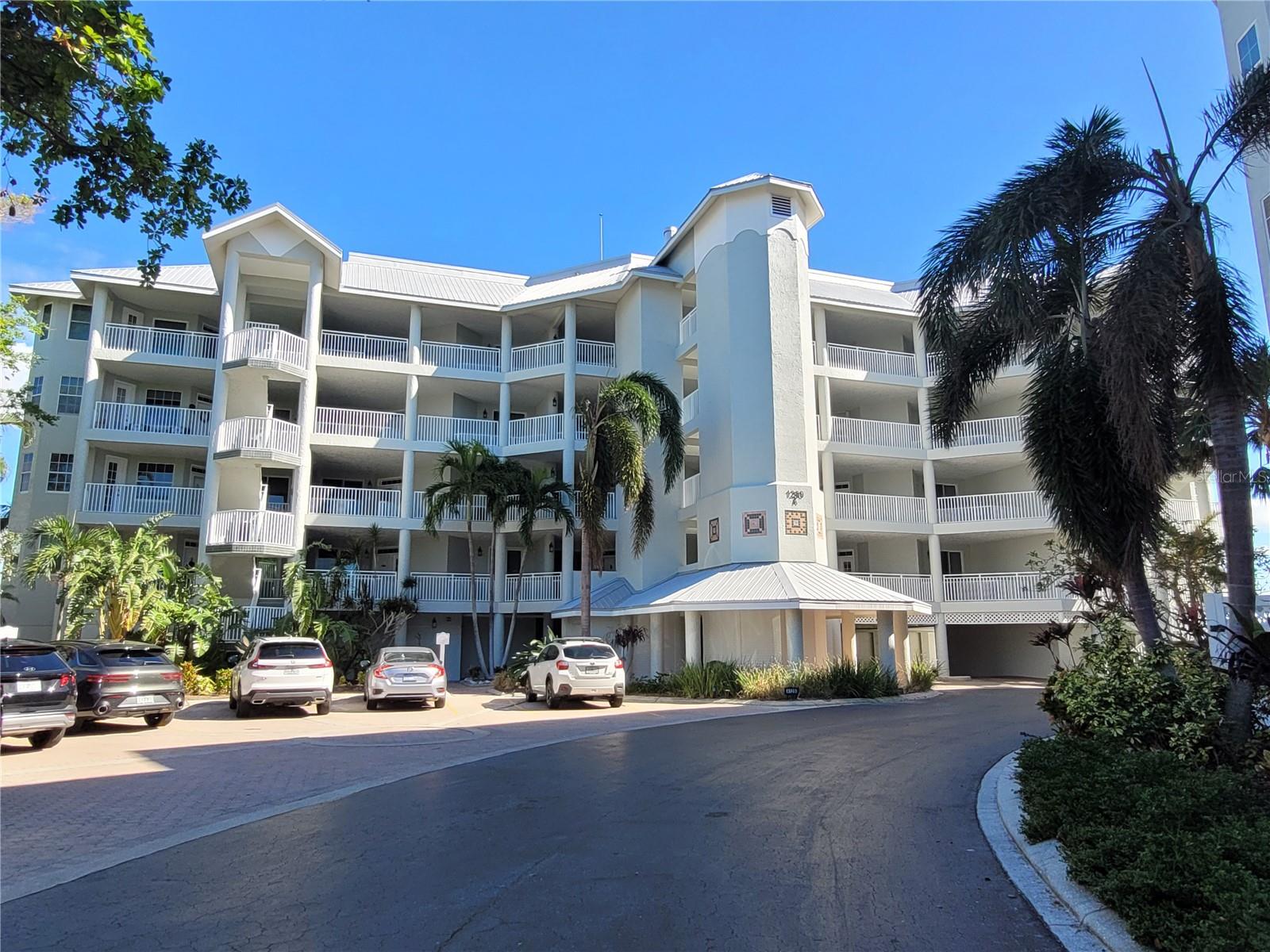Enjoy one of the best views on Siesta Key ~ unobstructed WATER VIEWS of the Bay/Intercoastal from your private large covered lanai with all new impact glass doors, and have coffee on your own private brick patio with water views that leads right out to the dock. This seasonal rental is available MAY 1, 2025, but this unit does have a 3 month minimum stay. This spacious unit is one of Siesta Key's best complexes on Dolphin Bay. This updated unit has a large kitchen with an eat in area making entertaining a breeze. This condo is beautiful and meticulously maintained. This unit lives like a home with an extra large living area, walk in closets, two dining areas, and enclosed laundry room. There is ample outdoor living space in front with two private covered patios and covered parking under the building in the private garage. Dolphin Bay is a flawlessly maintained, gated community that offers great amenities including: har-tru tennis courts, beautiful clubhouse, pool & spa, fishing pier, and day dock for boats. All just a short walk to Siesta Key Beach!