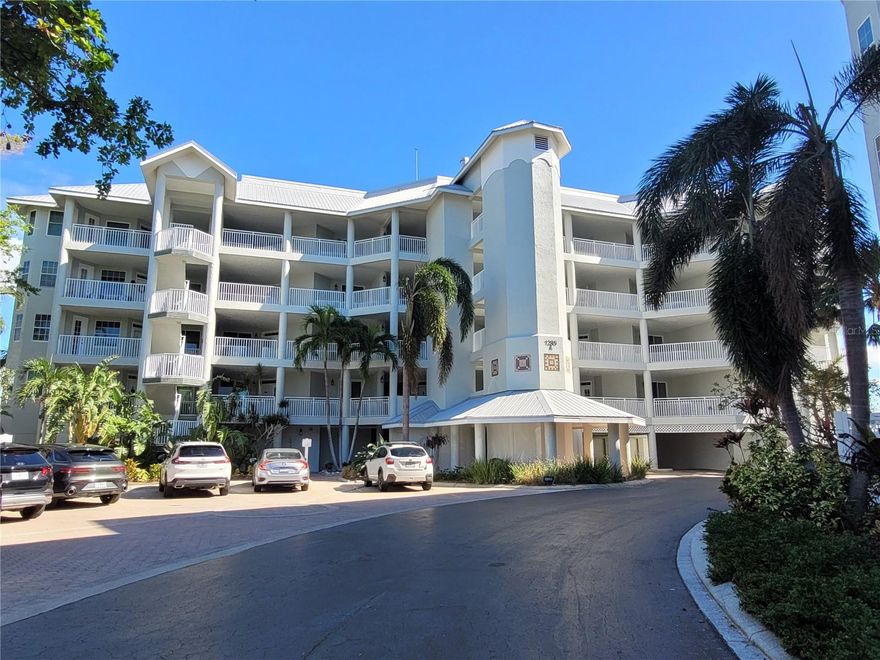 Enjoy one of the best views on Siesta Key ~ unobstructed WATER VIEWS of the Bay/Intercoastal from your private large covered lanai with all new impact glass doors, and have coffee on your own private brick patio with water views that leads right out to the dock. This seasonal rental is available MAY 1, 2025, but this unit does have a 3 month minimum stay. This spacious unit is one of Siesta Key's best complexes on Dolphin Bay. This updated unit has a large kitchen with an eat in area making entertaining a breeze.  This condo is beautiful and meticulously maintained.  This unit lives like a home with an extra large living area, walk in closets, two dining areas, and enclosed laundry room. There is ample outdoor living space in front with two private covered patios and covered parking under the building in the private garage.  Dolphin Bay is a flawlessly maintained, gated community that offers great amenities including: har-tru tennis courts, beautiful clubhouse, pool & spa, fishing pier, and day dock for boats. All just a short walk to Siesta Key Beach!