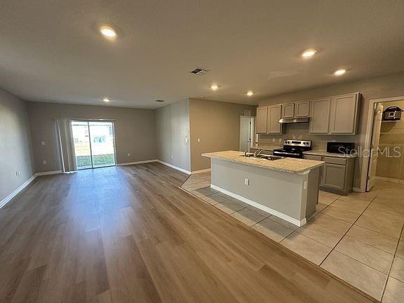 Photo of 1448 Berry Lane, Davenport, FL 33837 (MLS # O6445862)