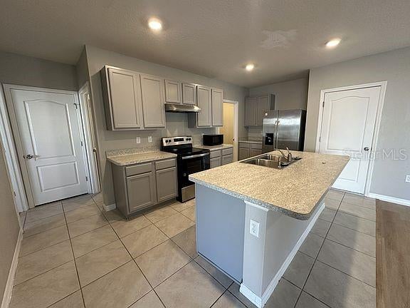 Photo of 1448 Berry Lane, Davenport, FL 33837 (MLS # O6445862)