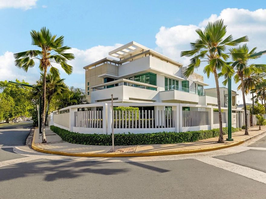 Impressive beach front estate located in Ocean Park, San Juan. This residence offers approximately 6,700 sqft of construction, including 4,500 sqft of interiors enhanced by over 2,200 sqft of terraces and patios, featuring 5 bedrooms and 5.5 bathrooms designed with both comfort and style in mind. It also includes a detached casita with its own bedroom, bathroom, kitchen, and extra space that can be turned into a gym or office for added convenience. Designed by architect Antonio Beale, the home combines modern elegance with comfort, highlighted by a rooftop plunge pool. Key amenities include an indoor/outdoor entertainer’s kitchen, gated parking for up to 5 vehicles, a 30kW generator with 6-day autonomy, a 500-gallon cistern with premium filtration and reverse osmosis, enterprise-grade fiber internet with full Wi-Fi coverage, a comprehensive security camera system with remote access, and Lutron lighting switches and outlets. Perfectly positioned, the property is directly across the beach, within steps to coffee shops, restaurants, and nightlife, and only minutes from St. John’s and Robinson School, as well as the newly renovated Parque Barbosa, which features tennis courts, pickleball courts, running track, basketball courts, a playground, and a new police station. CRIM:$5,762.00 yearly.