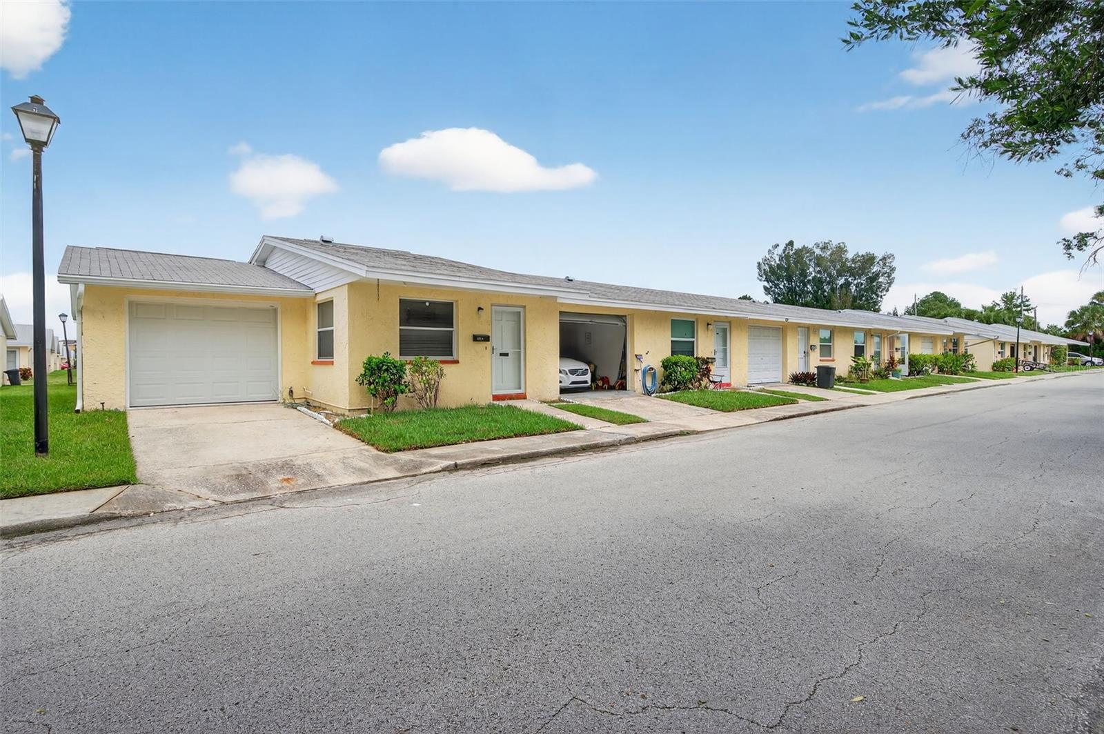 Welcome home to this warm and inviting 2-bedroom, 2-bath end unit villa where comfort meets convenience in a friendly 55+ neighborhood. The open living and dining space flows seamlessly into a bright kitchen with granite countertops, solid wood cabinets, and stainless steel appliances—perfect for cooking and entertaining. All upgraded to brand new after water intrusion last year. Take a short stroll to the community pool and clubhouse, Private beach access available with joining Gulf Harbors Beach Club option. Walkable shops and restaurants, and golf cart-friendly streets makes every day feels like a vacation. HOA includes water, sewer, trash, and exterior upkeep so you can spend more time enjoying the Florida lifestyle you love.