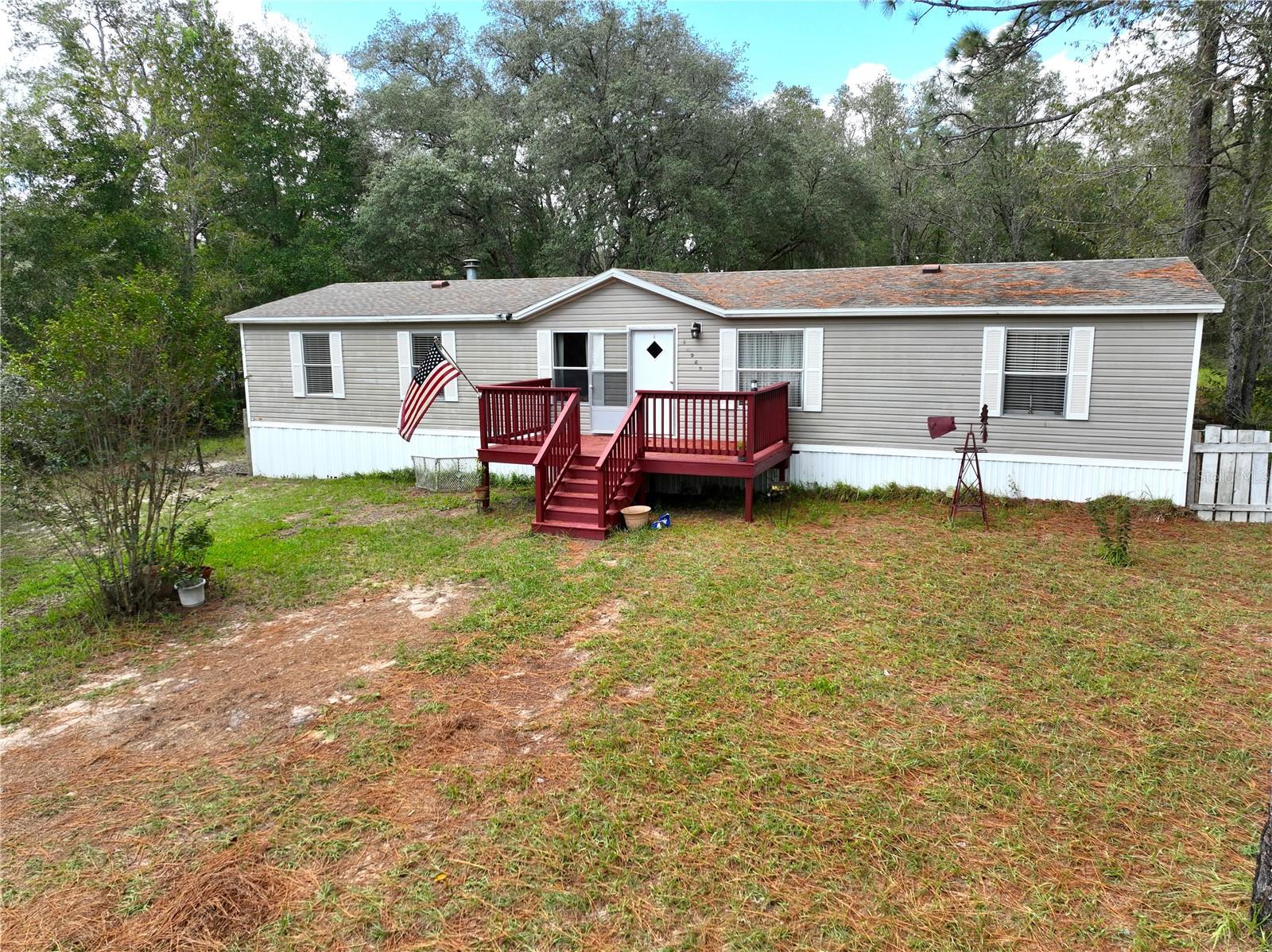 Welcome to 17525 SW 27th Street, a double-wide mobile home nestled in the quiet countryside of Dunnellon, Florida. This inviting home offers a perfect blend of comfort, space, and privacy on a generous lot, ideal for those seeking peaceful rural living while still being close to local conveniences.
Step inside to find a cozy living area, split-bedroom floor plan, and an open kitchen—perfect for family gatherings or relaxed everyday living. With 3 bedrooms and 2 bathrooms, there's ample room for a family, guests, or a home office.
Outside, enjoy the Florida sunshine from your porch or take advantage of the expansive yard, ideal for gardening, pets, or even future additions. The property also includes mature trees and space for parking recreational vehicles, boats, or trailers.
Located just minutes from the charming town of Dunnellon, you'll be close to the Rainbow River, shopping, dining, and outdoor recreation.
Whether you're looking for a full-time residence, seasonal getaway, or investment opportunity, this affordable and move-in ready home is worth a look!