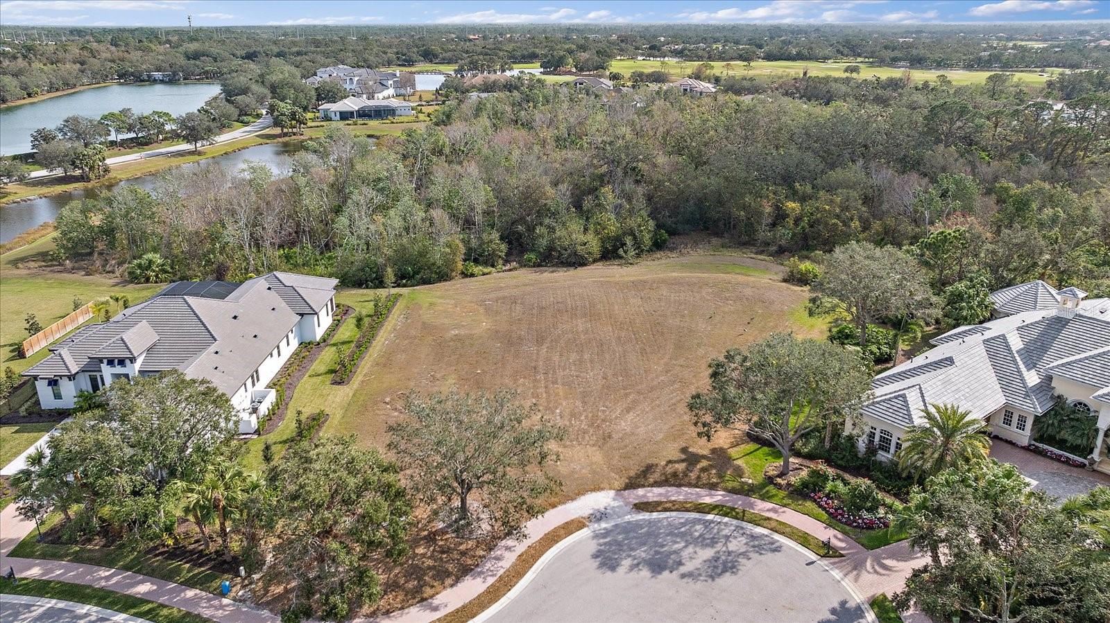 Build your dream home on this oversized, private Estate sized lot with beautiful preserve view in the gated community of The Founders Club. Must use a builder in The Founders Club Participating Builder program. This gorgeous 700-acre community is located close to University Town Center and all the conveniences you expect with a Sarasota address. Enjoy the recreation center (included with ownership) featuring tennis, basketball/pickle ball court, volleyball, playground, picnic area and yoga studio. Membership in the Golf Club featuring an 18-hole Robert Trent Jones, Jr. course, 24-hour fitness center, casual and fine dining and spa services is optional. THE PURCHASE OF A SIGNATURE GOLF MEMBERSHIP IS REQUIRED FOR PURCHASE OF THIS HOMESITE.