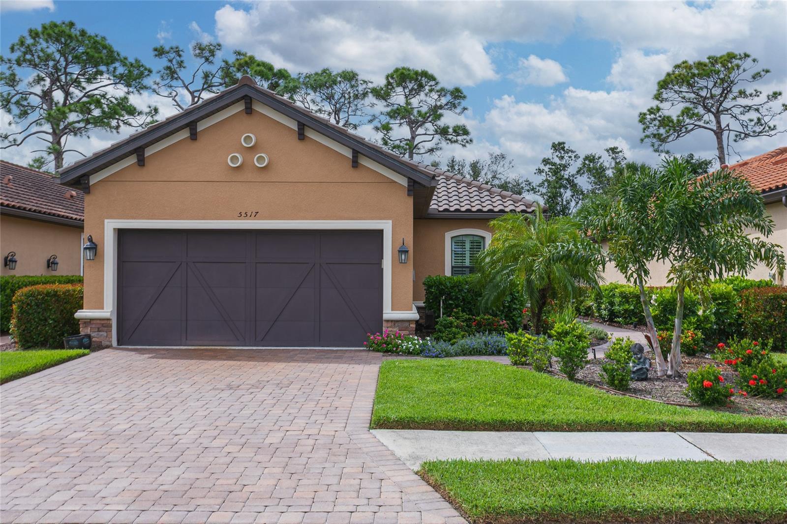 TURN-KEY!! Taylor Morrison Roma Model in Bellacina by Casey Key! Welcome to this immaculate 2 Bedroom, 2 Bathroom + Flex Room home, perfectly situated just 5 homes from the Bellacina Amenity Center! Step inside to an open-concept floor plan featuring upscale furnishings, plantation shutters, and ceramic tile flooring throughout the main living areas. The chef’s kitchen boasts GE stainless steel appliances, a gas cooktop and range, granite countertops, and a breakfast bar—ideal for entertaining or casual meals. At the rear of the home, you'll find a luxurious primary suite offering a peaceful retreat with a spacious ensuite bathroom featuring double sinks, neutral tile, and a custom walk-in closet designed for both elegance and functionality. The guest bedroom includes an en-suite option, with a door from the hallway that can be closed to create a private guest suite—ideal for visitors or multigenerational living. The den/flex room provides a perfect space for a home office, media room, or even an additional guest space—tailored to your lifestyle needs. Unwind in your screened lanai overlooking a serene grassy backyard—perfect for morning coffee or evening relaxation. This home comes with a hurricane impact front guest room window and is equipped with hurricane shutters, giving you added peace of mind during storm season. The epoxy-coated double garage adds style and durability, while the home’s location within the community offers unbeatable convenience. Just steps away, the resort-style amenity center offers a heated resort-style swimming pool with cabanas, 24-hour fitness center, a clubhouse with kitchen and event room, jacuzzi spa, firepits, 4 lighted pickleball courts and tru-har tennis court, playground, and 2 dog parks. Outdoor enthusiasts will love direct private access to the famous Sarasota Legacy Trail—ideal for walking, biking, or jogging. Take your golf cart just 2.5 miles to Nokomis Beach, restaurants, ice cream parlor, and shopping center, or enjoy quick drives to Downtown Venice Island (10 mins), Siesta Key Beach (20 mins), and Downtown Sarasota & SRQ Airport (35 mins). Don't miss this incredible opportunity to live in one of Sarasota County’s most desirable gated communities—Bellacina by Casey Key. Florida living starts here!