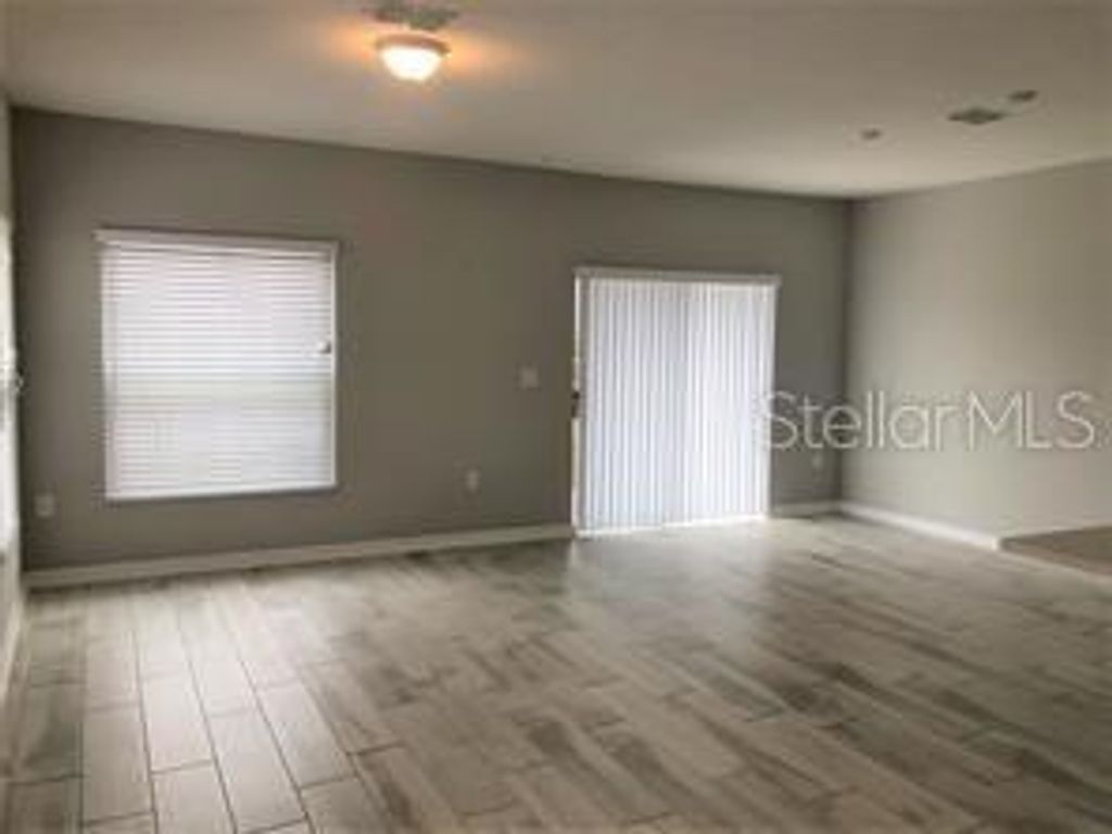 Photo of 250 Evertree Loop, Sanford, FL 32771 (MLS # O6386740)