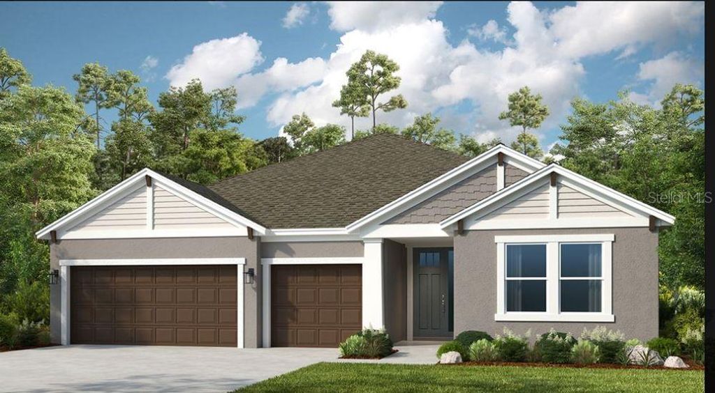 Photo of 33422 Landsman Loop, Wesley Chapel, FL 33543 (MLS # J977428)