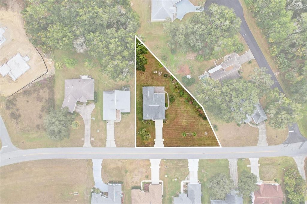 Photo of 2651 N Canterbury Lake Drive, Hernando, FL 34442 (MLS # OM714138)