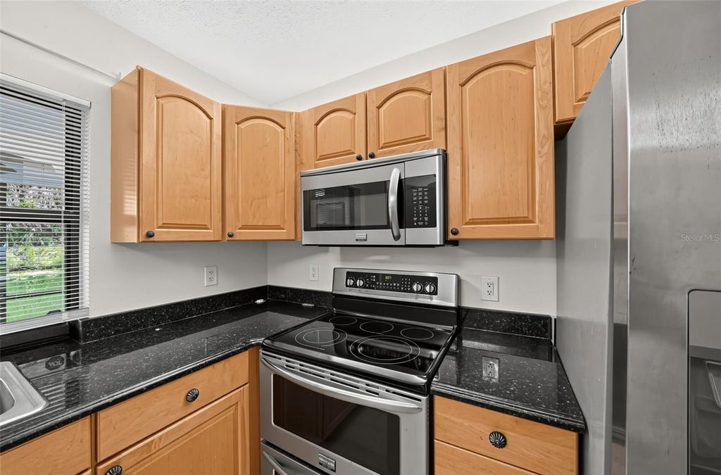 Photo of 3951 SW Cheribon Street, Port Saint Lucie, FL 34953 (MLS # TB8543630)