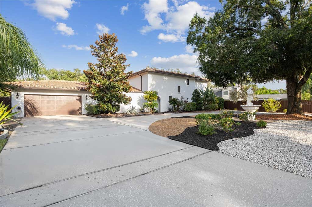 Photo of 403 Weeburn Road, Temple Terrace, FL 33617 (MLS # TB8532108)
