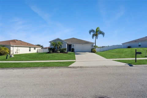 Photo of 2256 Gladiolus Lane, Mascotte, FL 34753 (MLS # O6453241)