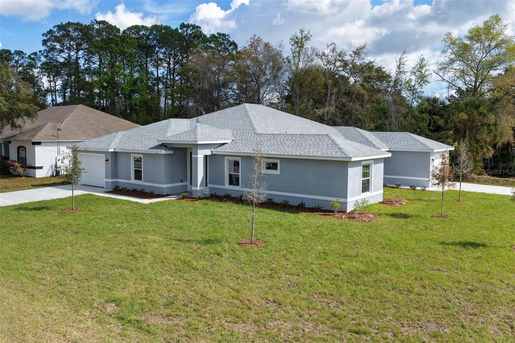 Photo of 95 Providence Lane, Palm Coast, FL 32164 (MLS # FC316893)