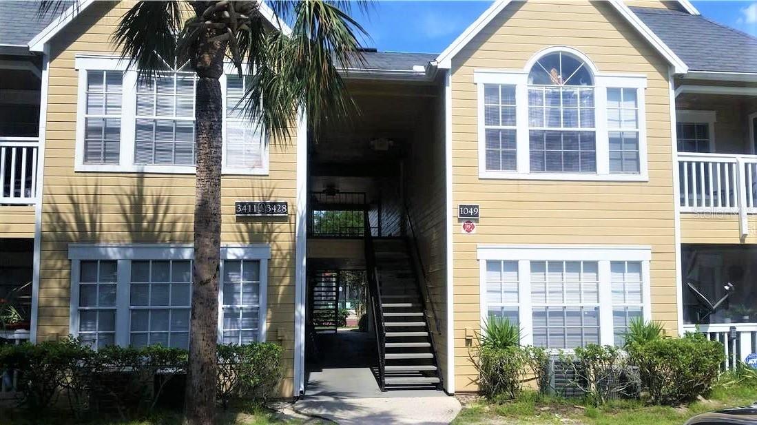 Beautiful ground floor apartment. Tile floors in living room and wet areas, carpet in bedroom only. Granite countertop on kitchen and bathroom cabinets, nice bathroom mirror, modern sink and faucet, switches and outlets are Italian style with stainless steel plates, microwave over stove, with laundry inside the unit and free parking with plenty of parking spaces. Modern ceiling fan and light fixtures. The complex has two pools with spa, one of these right behind the apartment. The tennis court and gym are very close to this unit. The community car wash area with vacuum is right next to the building. This complex has a covered grill area, with tables with a beautiful lake view. Open community, on-site security, quiet condo close to I-4 and 408, Valencia College, Millennium Mall and theme parks. Great schools. This condo has a special location with direct access to Hiawassee Rd very close to HW 408 and Kirkman Rd, close to a shopping plaza with great restaurants for dinner and fast food, bar, pharmacy, gas and supermarket minutes away from here. Great opportunity to live in this nice subdivision, one of the best in the Metrowest area, close to everything. Water is included.