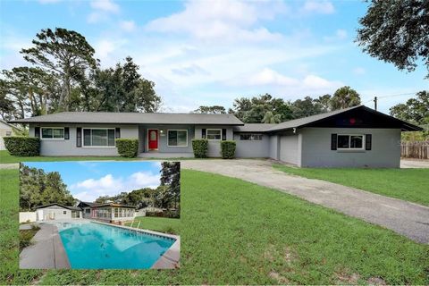 Photo of 4223 E Pine Hill Circle, Orlando, FL 32808 (MLS # O6402392)