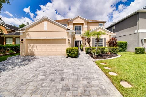 Photo of 13425 Early Frost Cir, Orlando, FL 32828 (MLS # O6324935)