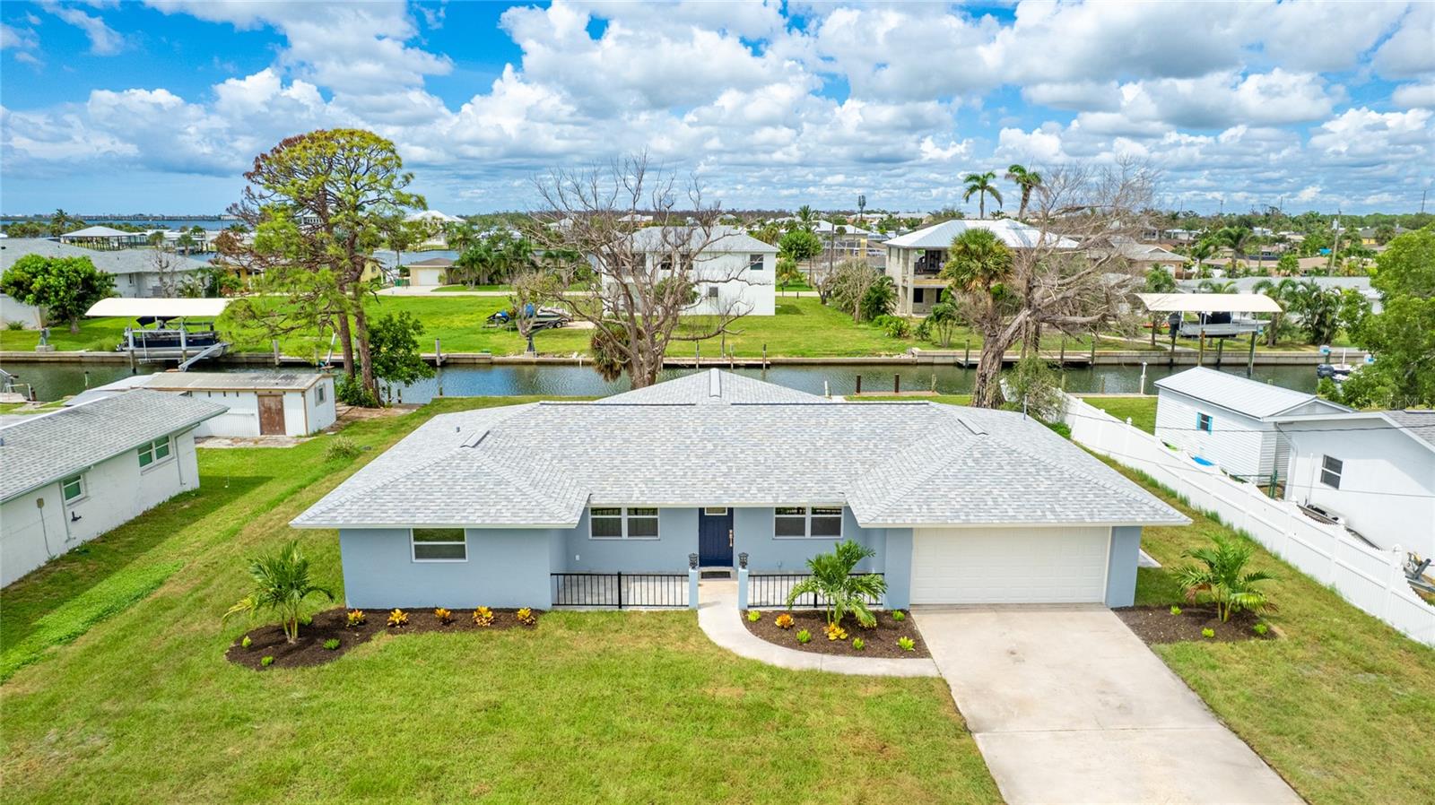 Easy deep water access to Lemon Bay and the Gulf – Boater’s Paradise! This home is a waterfront 3 bedroom, 2 bath retreat! Totally remodeled home offers the perfect blend of coastal living, modern comfort, and direct access to the open waters. Nestled in one of SWFL’s most desirable boating areas, with easy access to great fishing and the beaches, this home is the epitome of Florida life. The open floor plan with light-filled living spaces, tile floors, and plenty of room for entertaining inside or outside on the new paver deck. Just installed, brand new cabinets, quartz countertops, and stainless steel appliances make cooking your fresh catch a joy. A short walk down the paver path brings you to your very own dock, with upgraded high seawall. All the bathrooms feature brand new toilets, showers, and vanities as well. Schedule a showing to take a look at fantastic find on Lemon Bay.