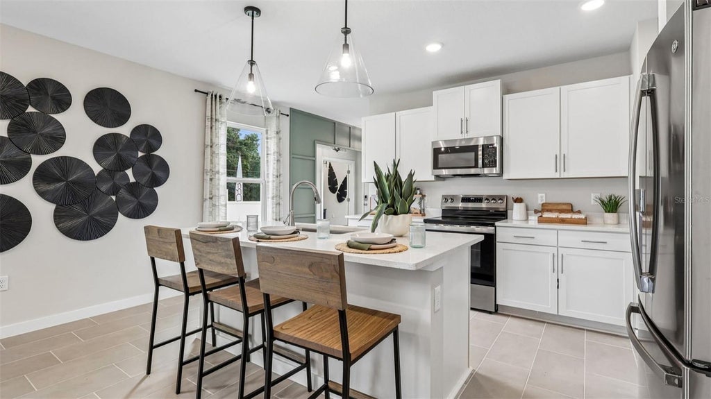 Photo of 1956 Diamond Head Circle, Lake Hamilton, FL 33851 (MLS # O6452446)