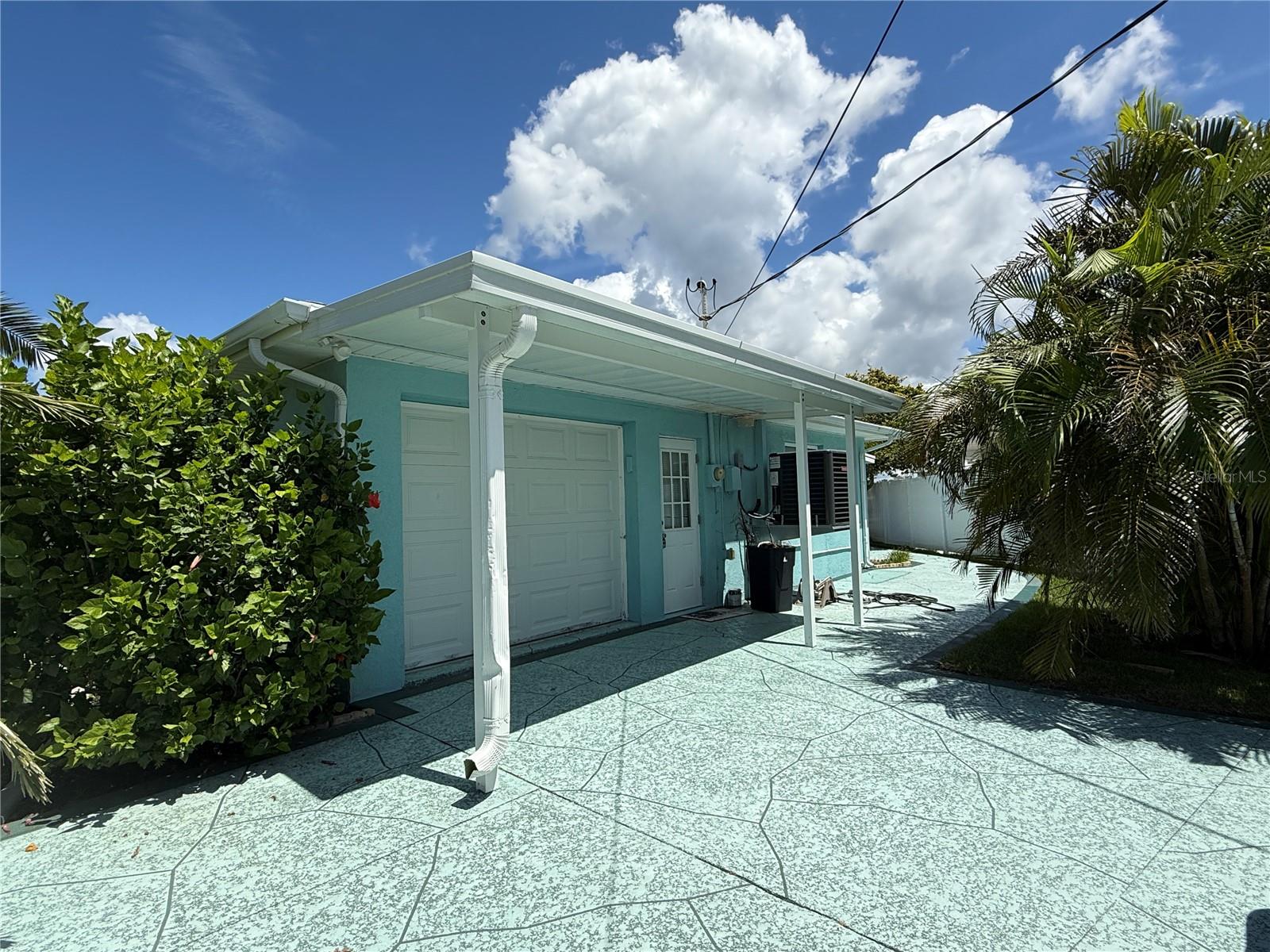Live the coastal dream on a quiet, low-traffic canal off Dolphin Bay with your own floating dock and deep-water access to the Gulf—perfect for boats, jet skis, and kayaks. Watch dolphins cruise by from the expansive covered patio, or unwind in the glass-enclosed, air-conditioned lanai for year-round enjoyment. Inside, a split floor plan delivers comfort and privacy with light-filled living spaces, ceramic tile throughout, and a cozy fireplace for ambiance. The kitchen features quartz counters, tile backsplash, and ample storage; both bathrooms are updated with modern vanities. Outside, twin patios open to a pavered backyard that runs to the seawall—made for entertaining after a day on the water. Practical perks include a one-car garage with washer/dryer hookups, driveway parking for three vehicles, a carport extension (great for a golf cart or water toys), and a storage shed. Golf-cart-friendly Hernando Beach puts you minutes from marinas, restaurants, parks, and the Suncoast Parkway—plus endless fishing, scalloping, and paddling spots. Ready for waterfront living? Schedule your private showing today.
