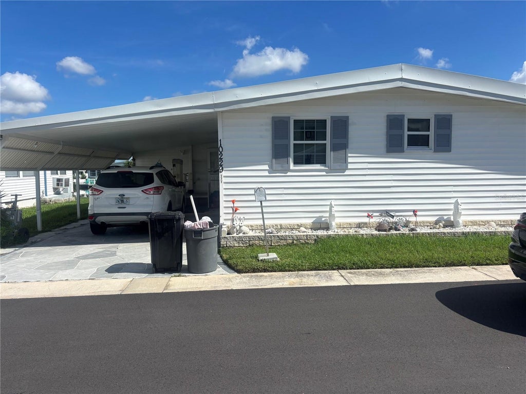 Photo of 10229 S Lake Drive #171, Largo, FL 33773 (MLS # TB8544101)
