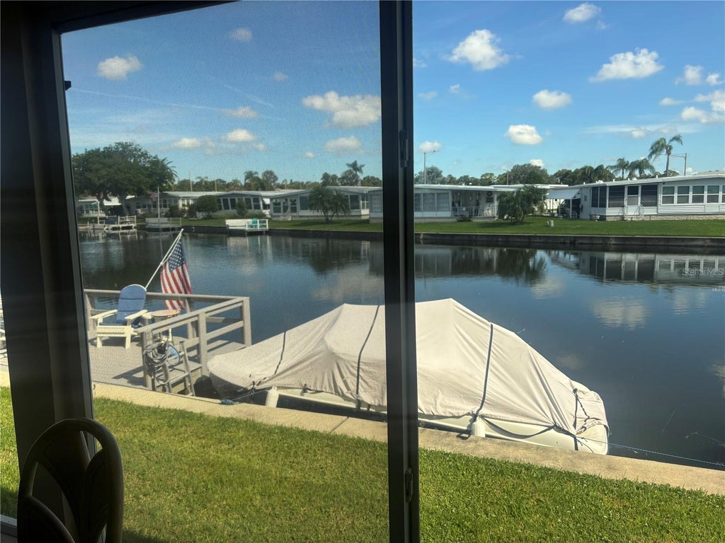 Photo of 10229 S Lake Drive #171, Largo, FL 33773 (MLS # TB8544101)