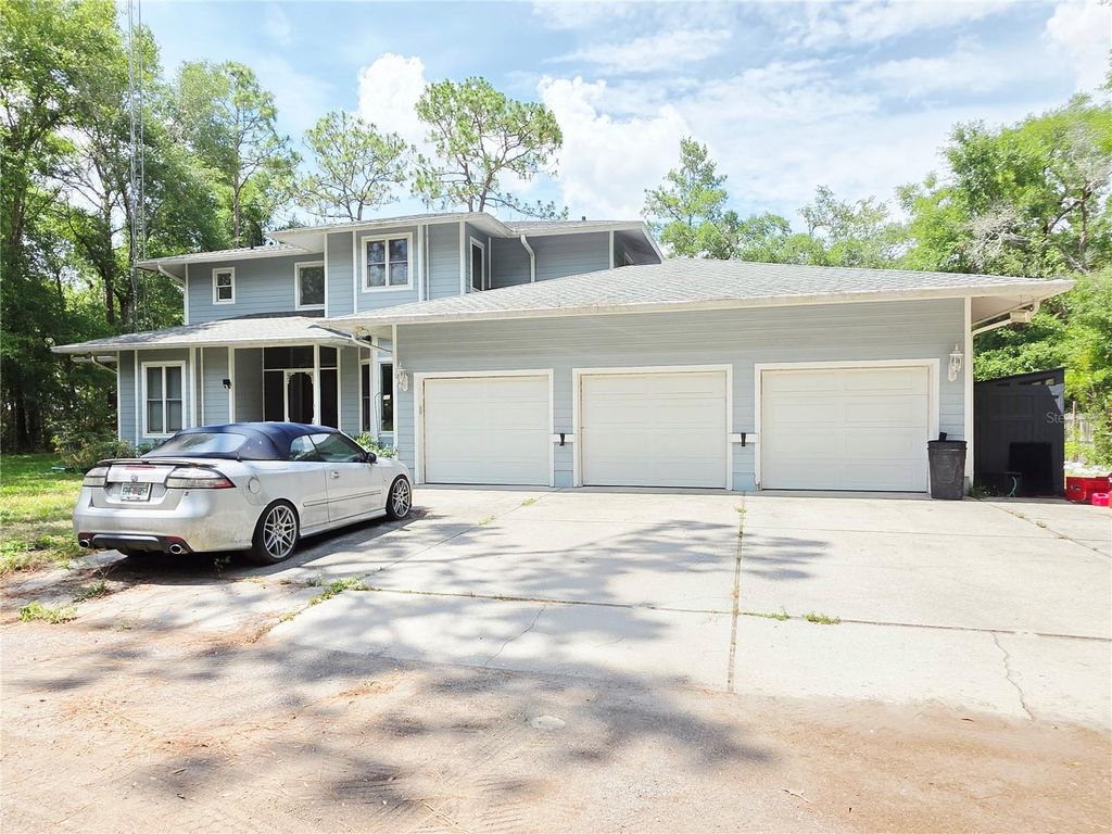 Photo of 2975 E Withlacoochee Trail, Dunnellon, FL 34434 (MLS # TB8394719)