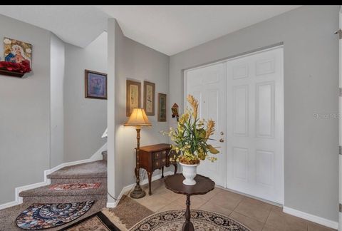 Photo of 9708 Old Patina Way, Orlando, FL 32832 (MLS # O6386055)