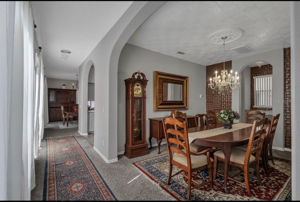 Photo of 9708 Old Patina Way, Orlando, FL 32832 (MLS # O6386055)