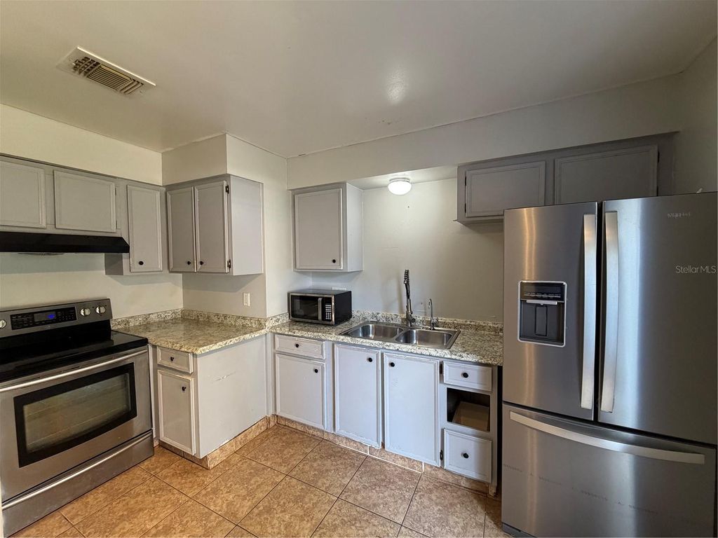 Photo of 84 E Marbrisa Way, Kissimmee, FL 34743 (MLS # S5141092)